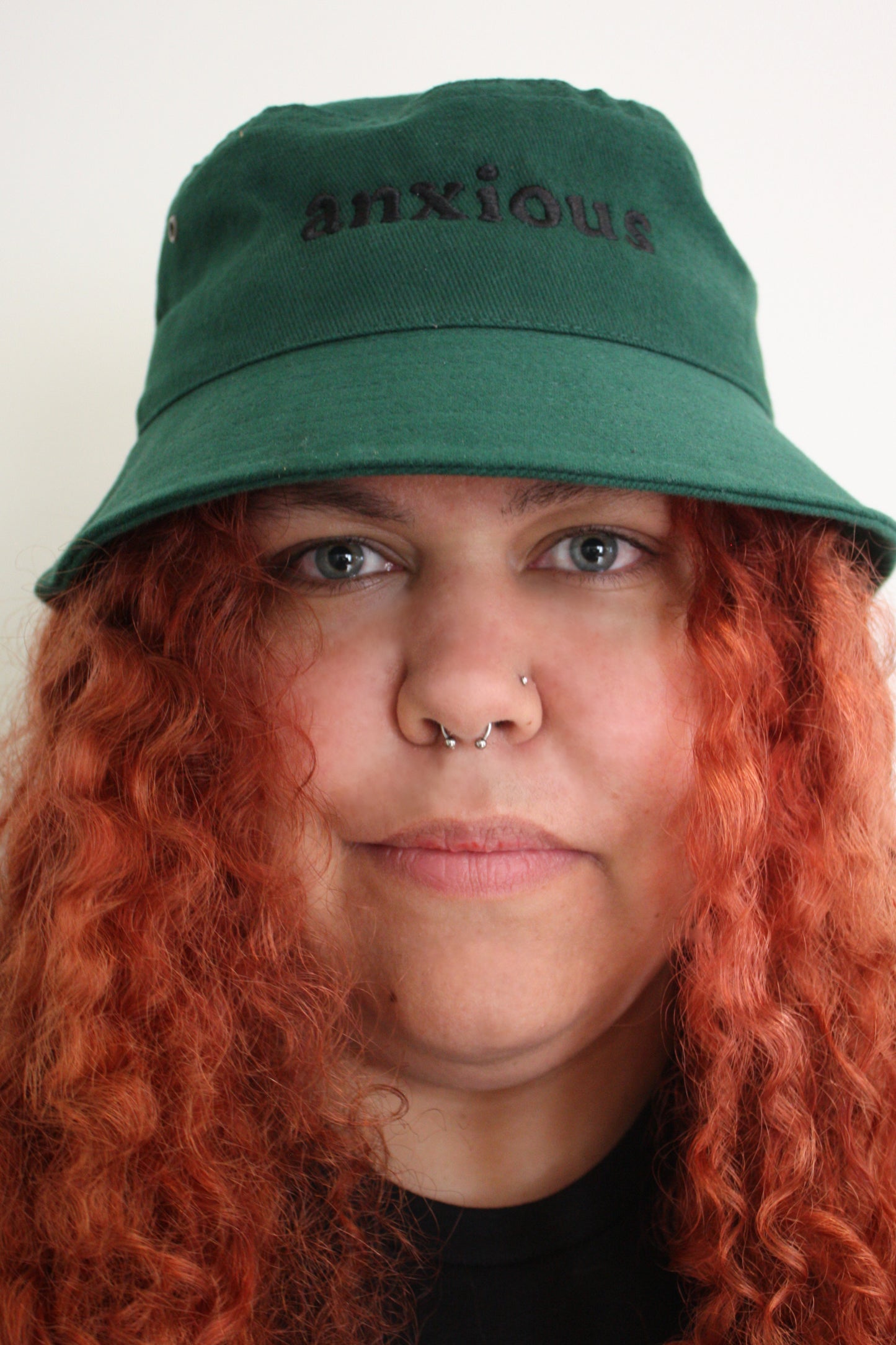 Bucket of Anxiety - Cooked Concepts (the best hat for sun protection, but a warning to others your anxiety is a thing. Bottle green with black embroidery saying ANXIOUS)